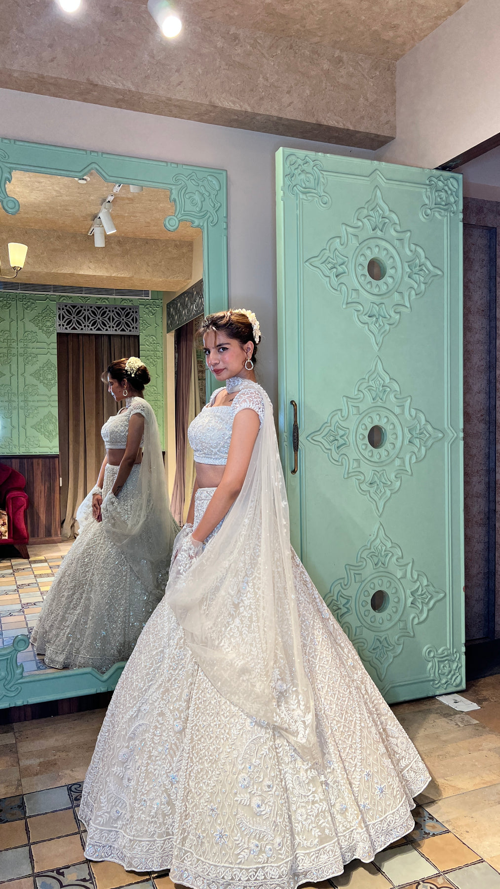 elegant white color floral motif embroidered lehenga