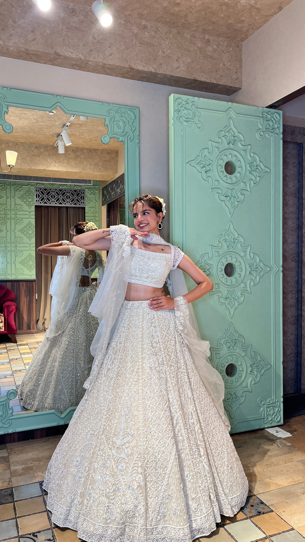 elegant white color floral motif embroidered lehenga