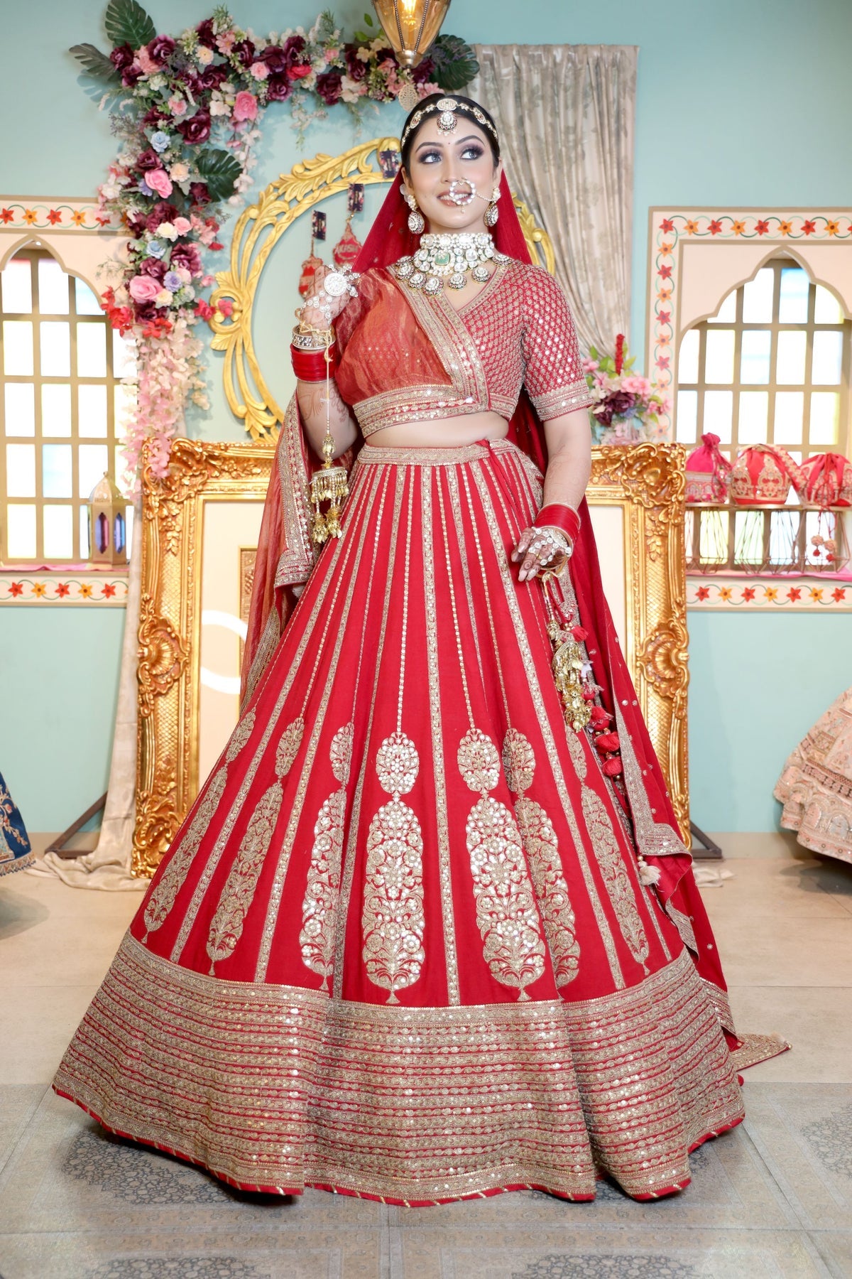 beautiful red color bridal embroidered lehenga with heavy blouse and matching dupatta
