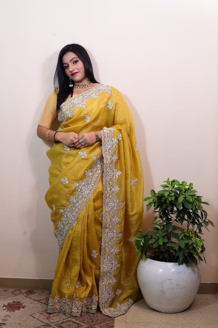 Radiant Yellow Tissue Saree with Intricate Embroidery