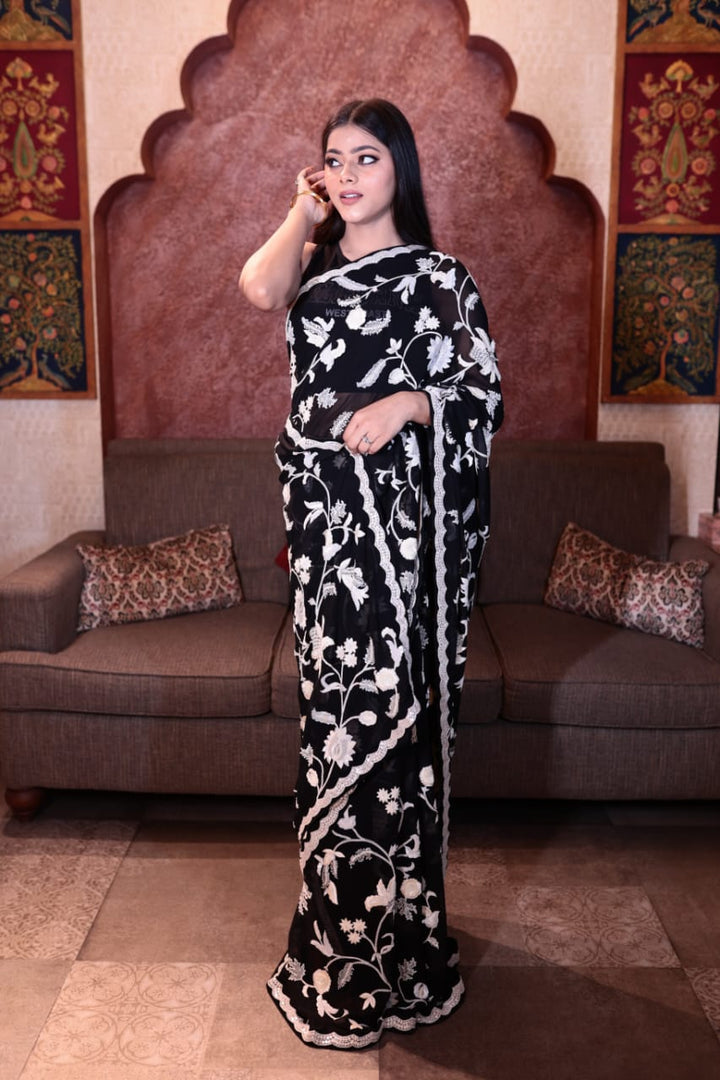Elegant Black Georgette Saree with Intricate White Embroidery