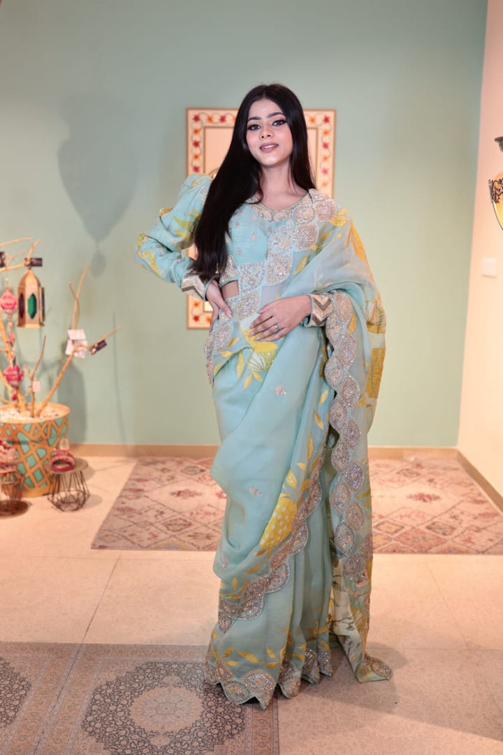 Luxurious Arctic Blue Crepe Saree with Intricate Embellishments