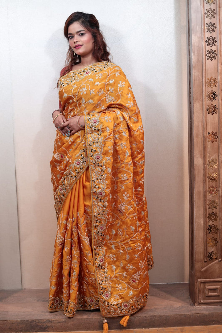 Radiant Orange Chiffon Saree with Intricate Embroidery