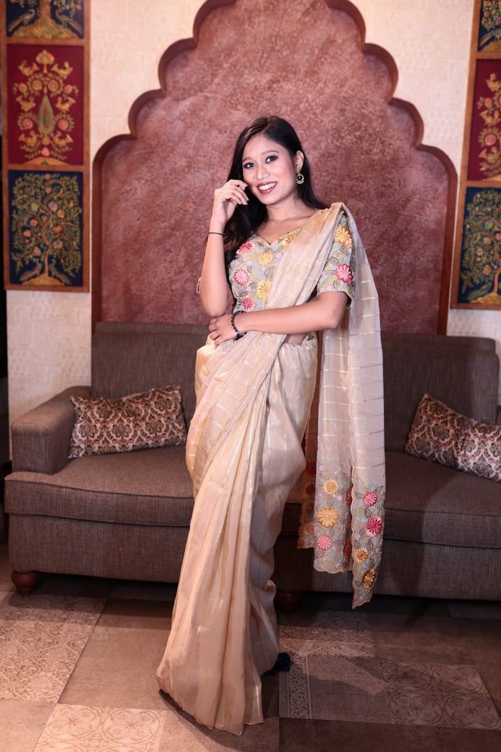 Elegant Off White Tissue Silk Saree with Floral Embroidery