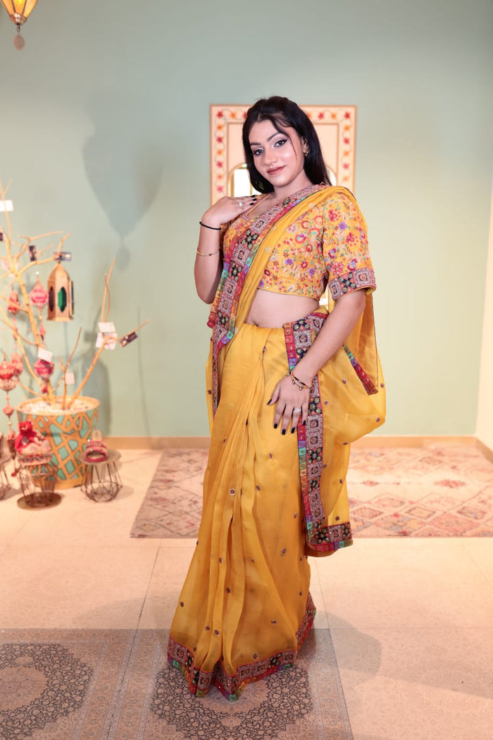 Opulent Butterscotch Organza Saree with Intricate Border