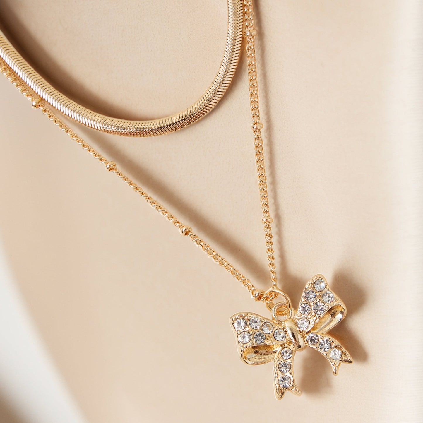 Gold Layered Pave Bow Pendant Necklace