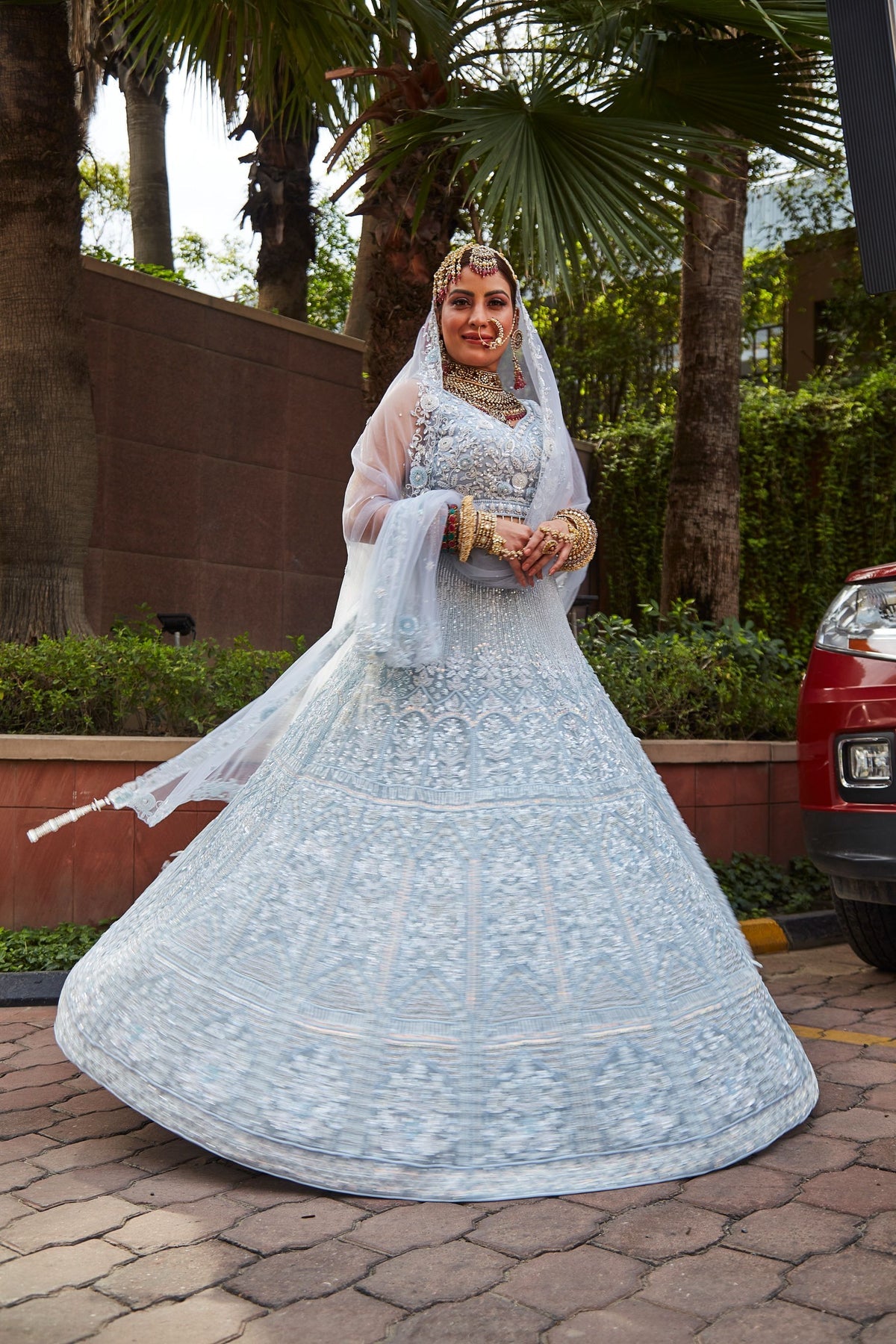 elegant white color floral motif embroidered lehenga set