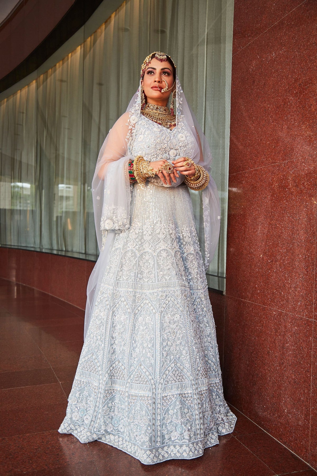 elegant white color floral motif embroidered lehenga set