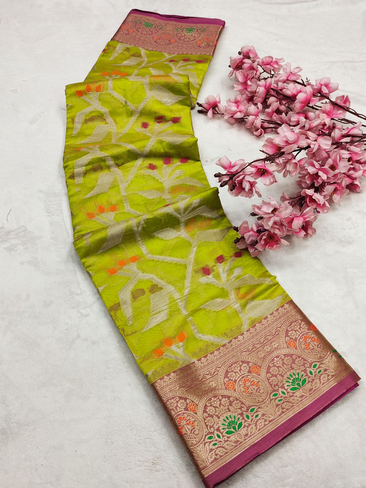 Sizzling Mehndi Organza Silk Saree With Comely Blouse Piece