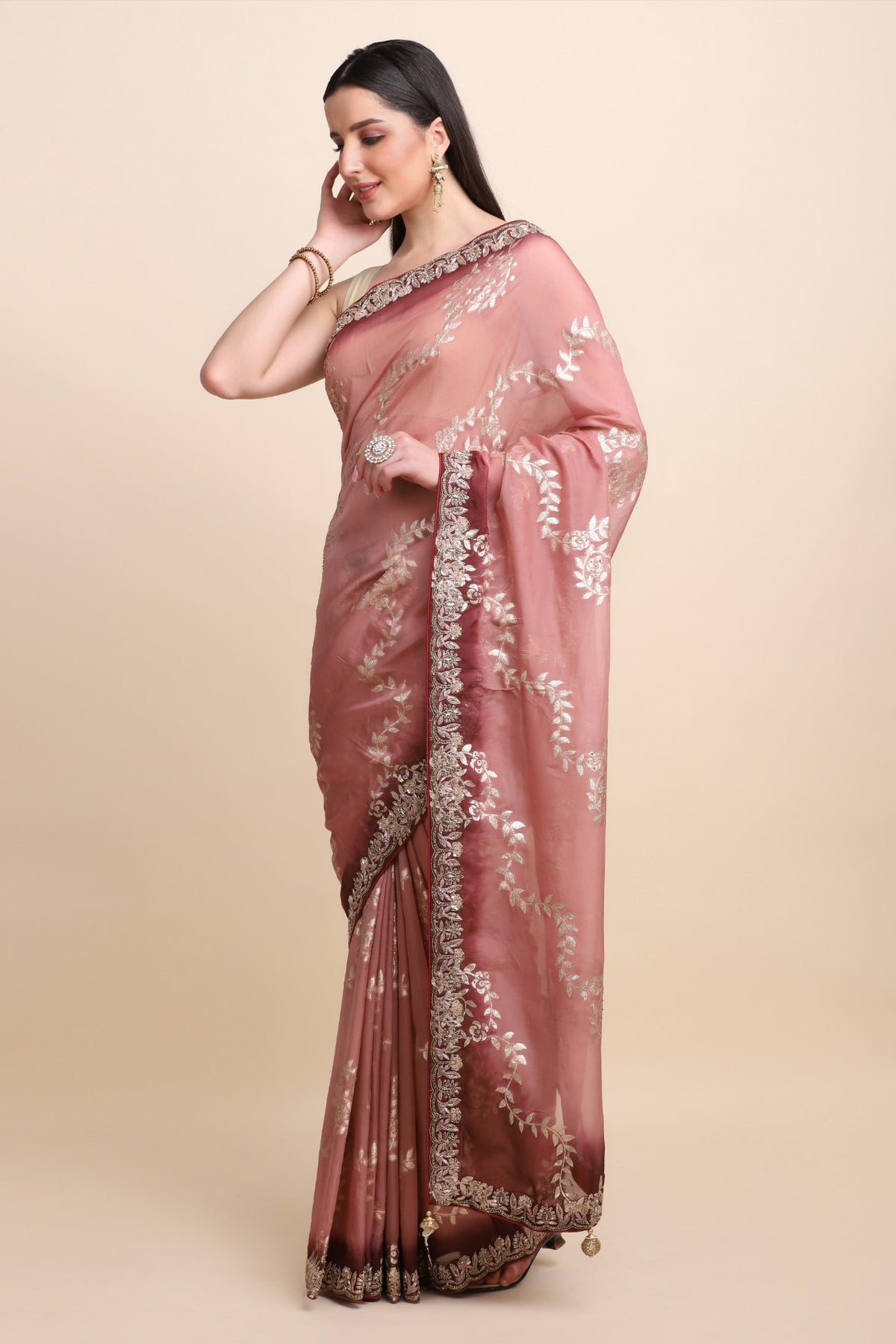 Beautiful peach color woven embroidered saree