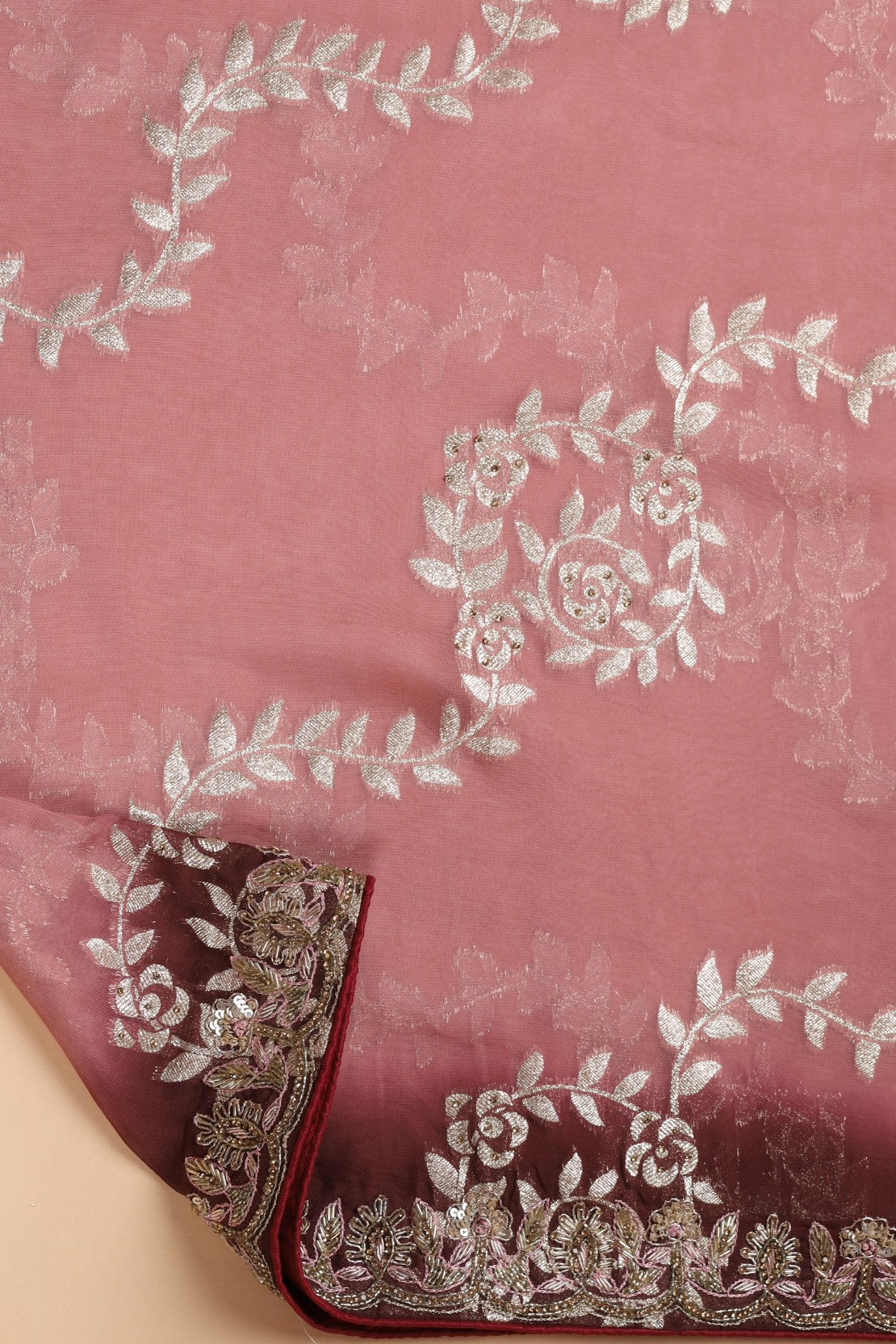 Beautiful peach color woven embroidered saree