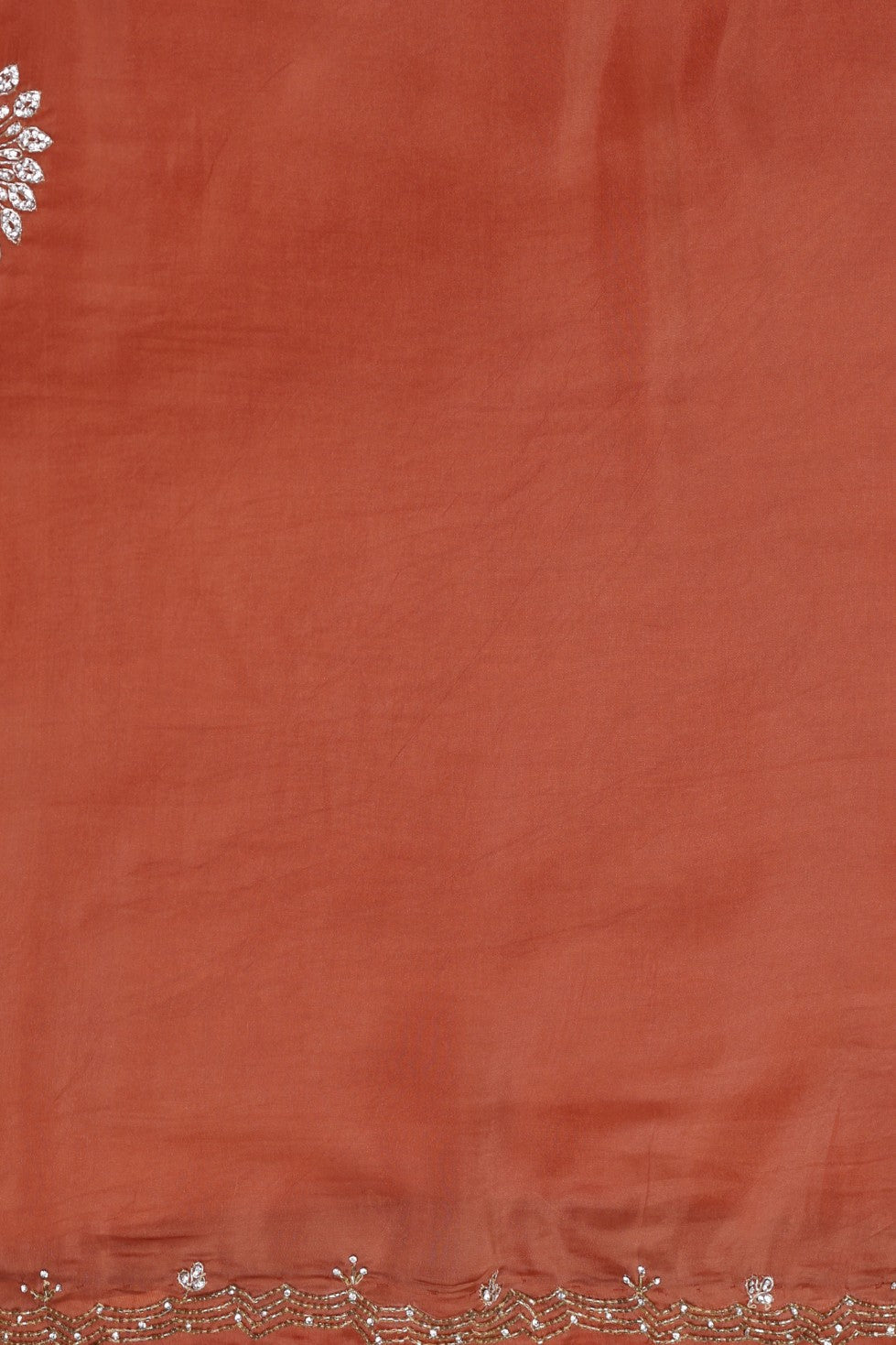 Elegant rusty orange color peacock motif embroidered saree