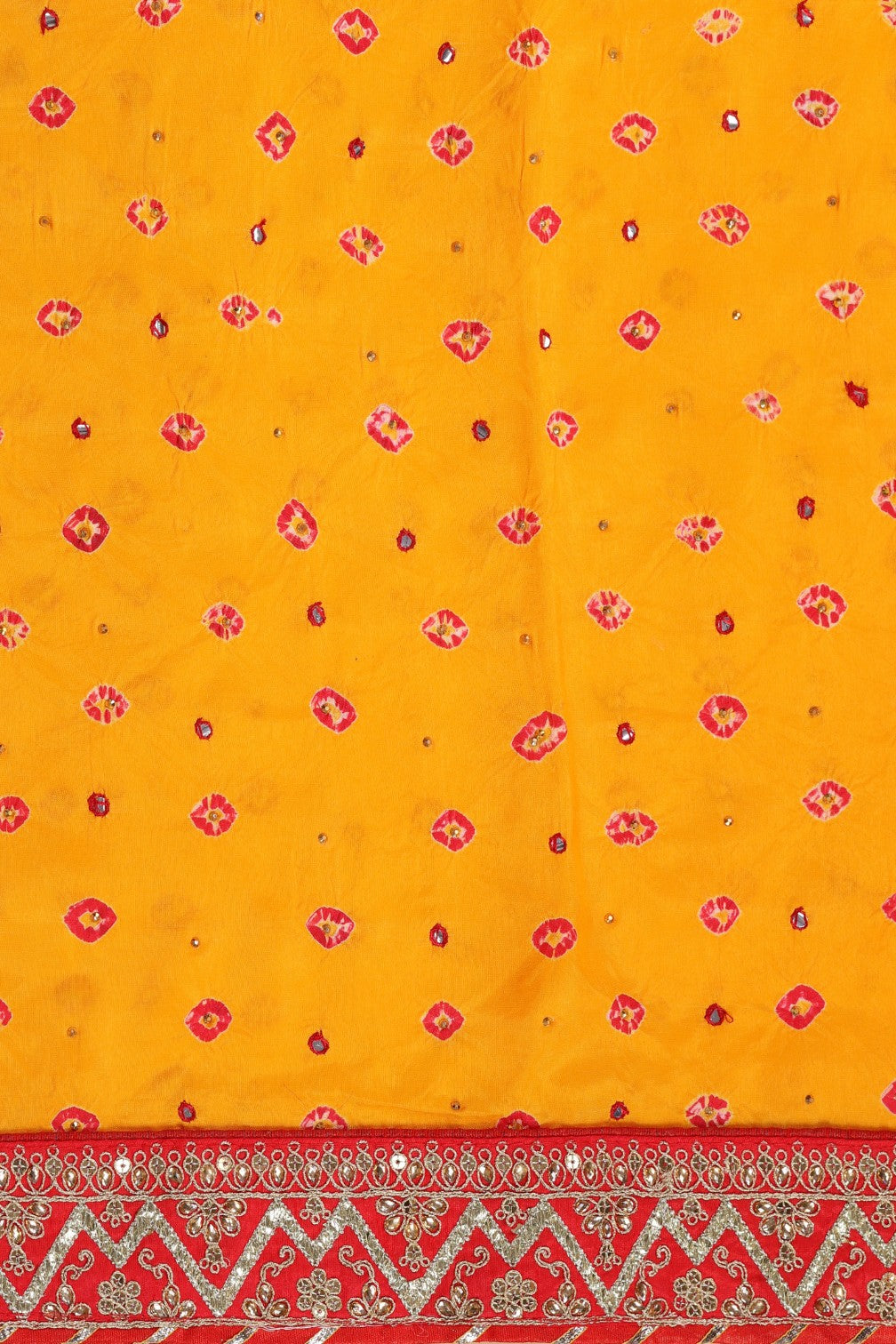 Beautiful yellow color tie & dye bandhini effect saree paired with matching blouse