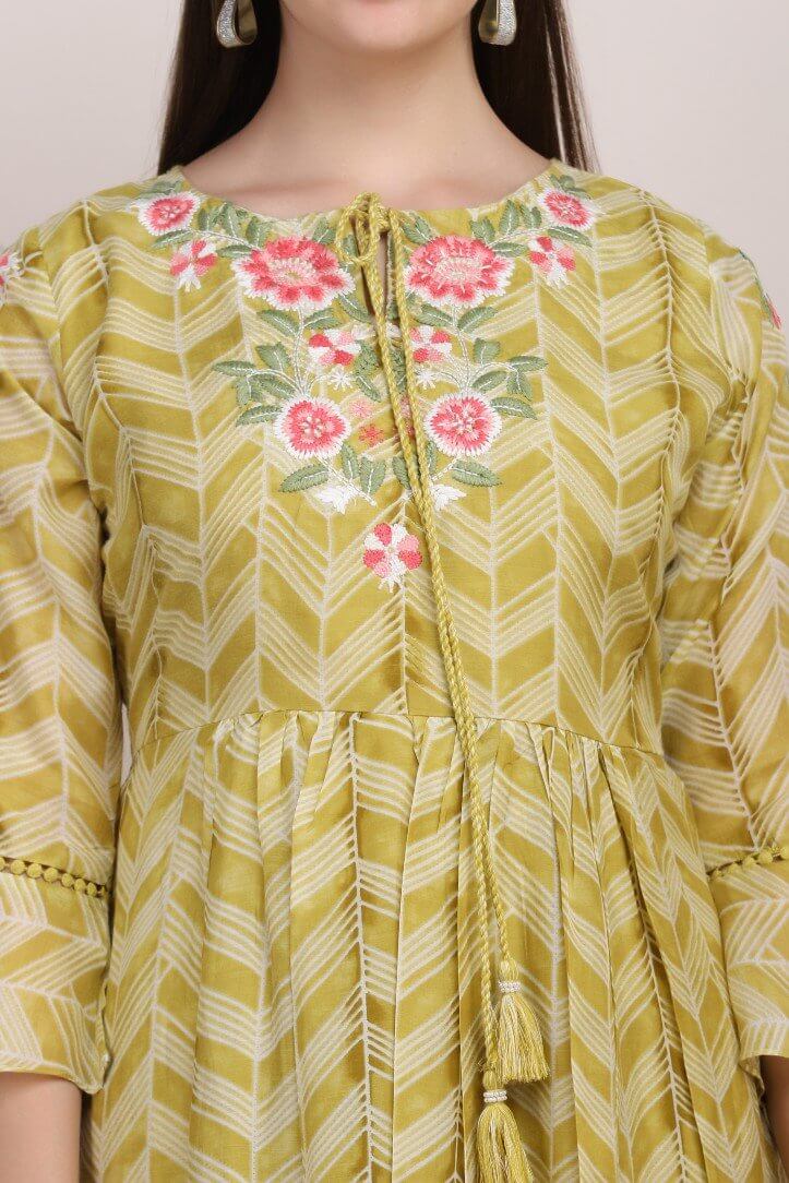 GREEN PRINTED KURTI WITH FLORAL EMBELLISHMENTS