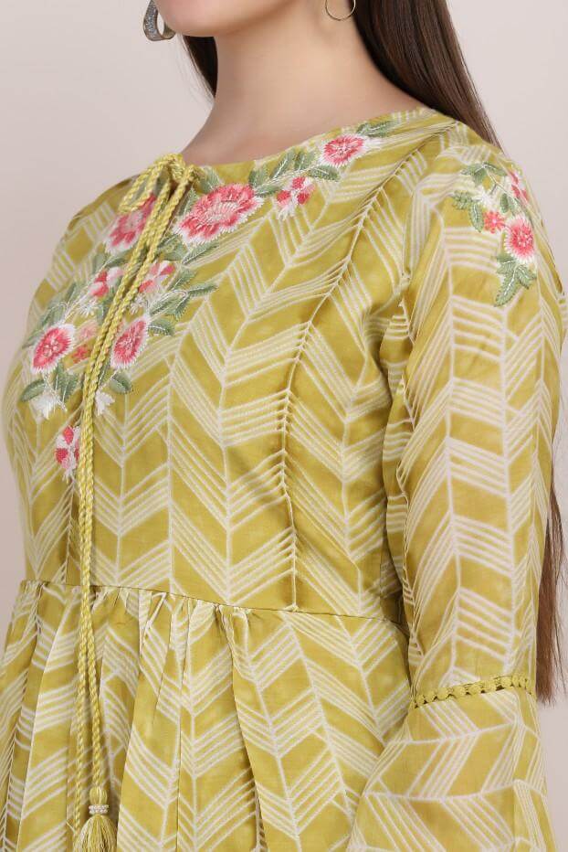 GREEN PRINTED KURTI WITH FLORAL EMBELLISHMENTS