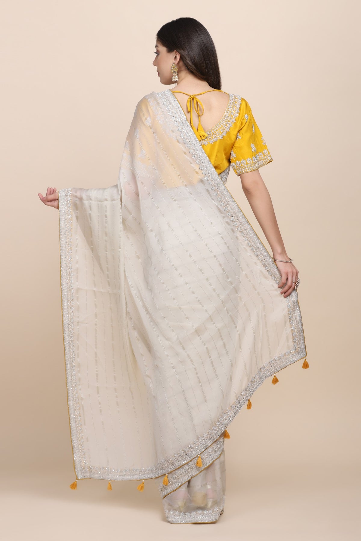 Elegant beige color stripes organza embroidered saree