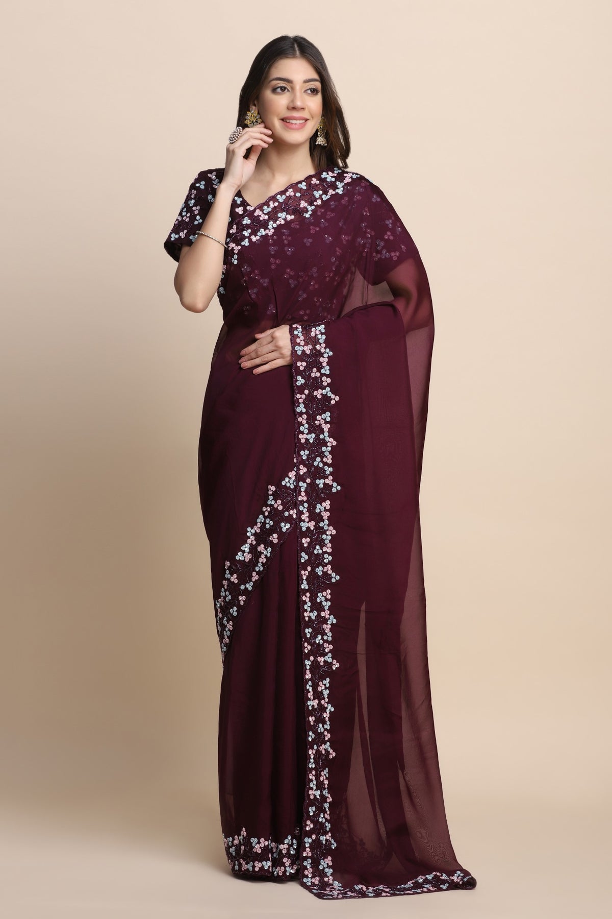 Glamorous wine color floral embroidered saree