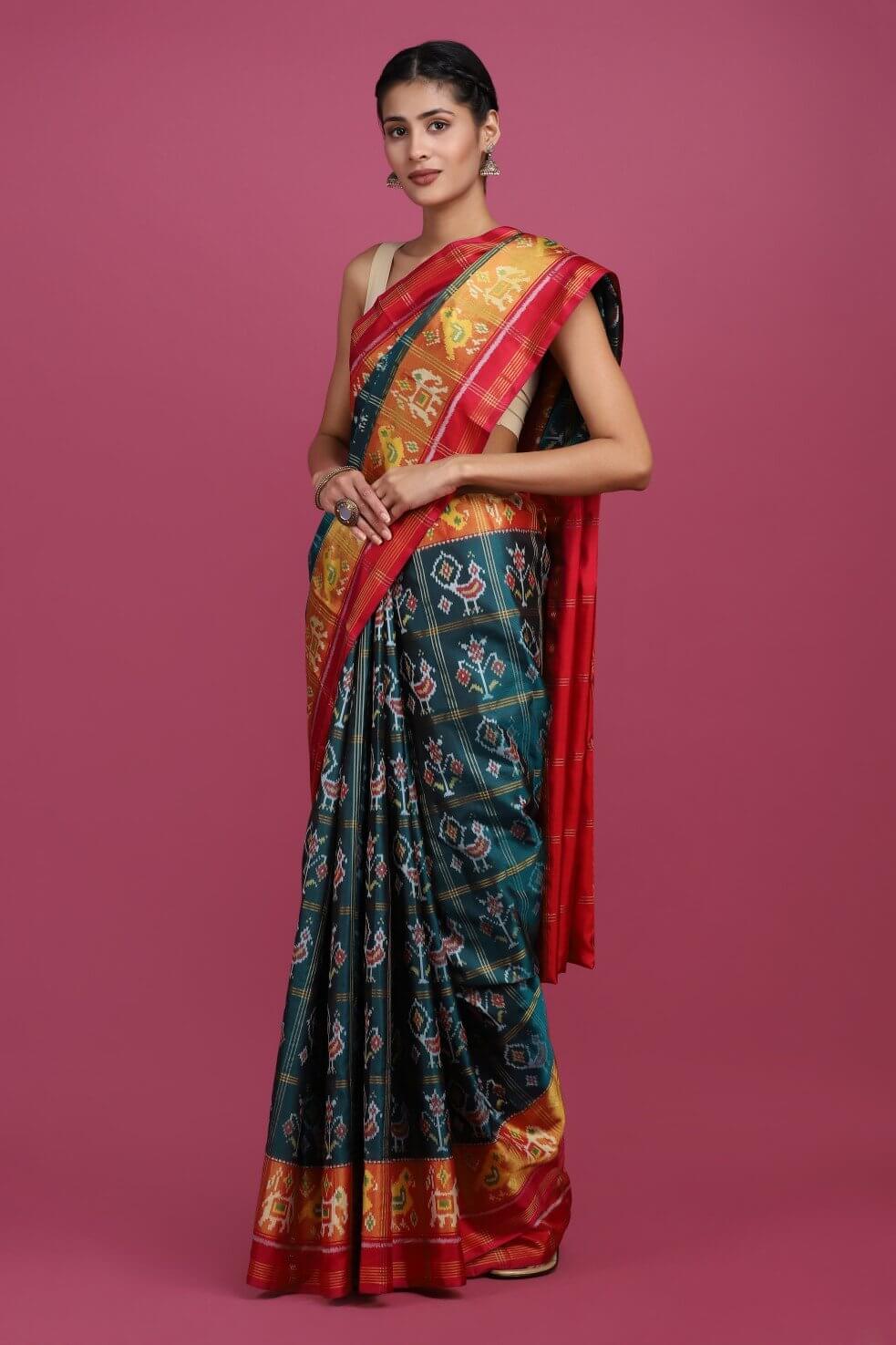 Green woven patola saree with blouse