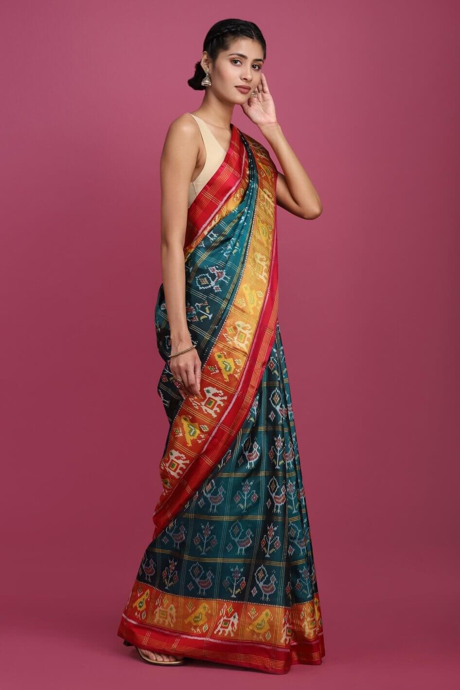 Green woven patola saree with blouse
