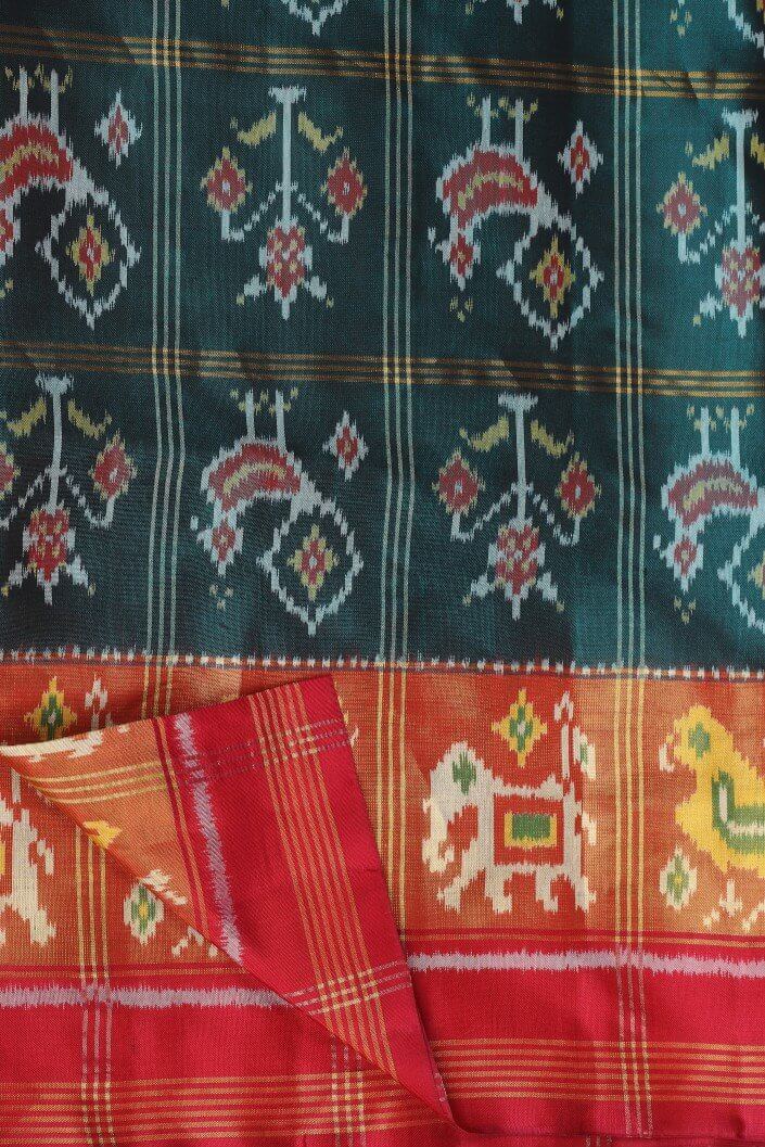 Green woven patola saree with blouse