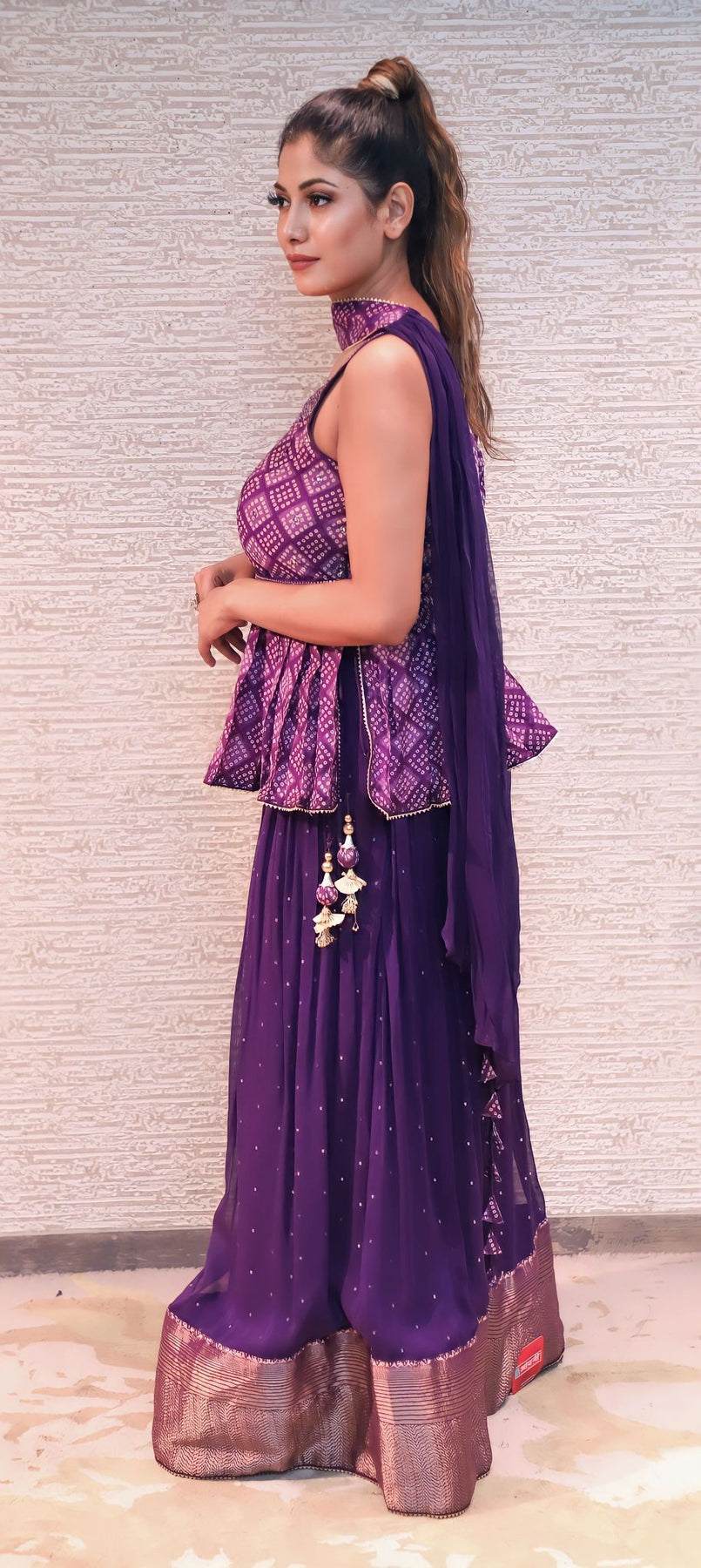 stylish purple color geomatical motif peplum top & sharara set