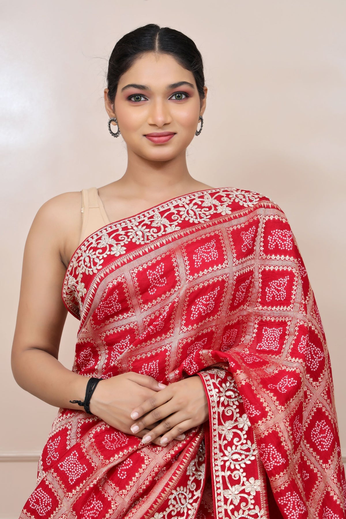 classy red color check with floral motif saree