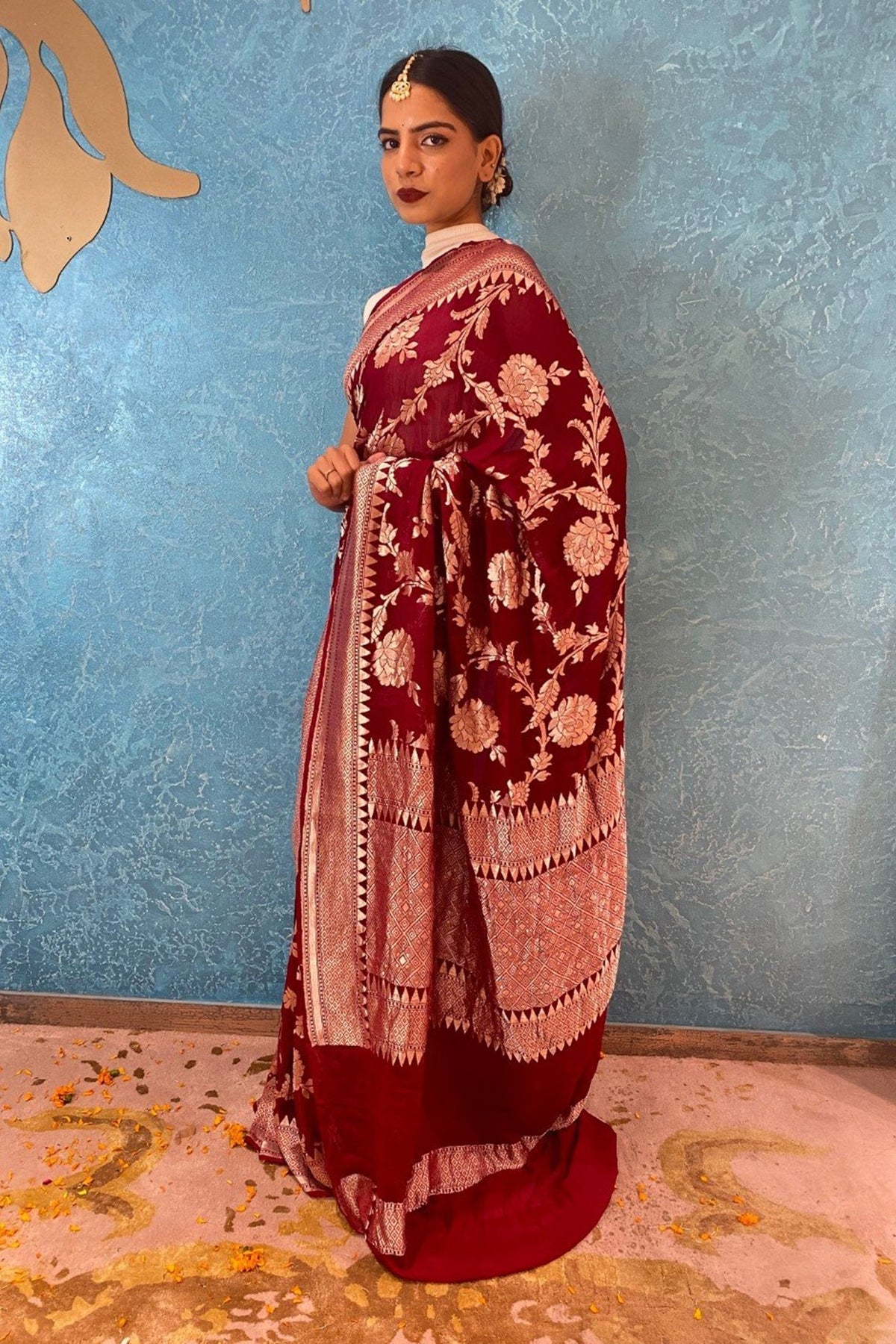 Woven maroon saree with floral jaal and bouse