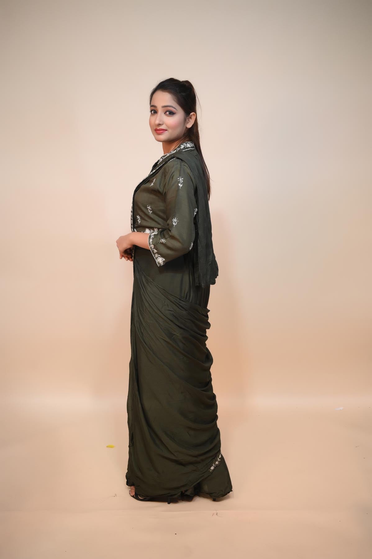 Mesmerizing Mehndi Green Raw Silk Dress: Exquisite Mirror Work, Cut Dana, and Sequin Embellishments"