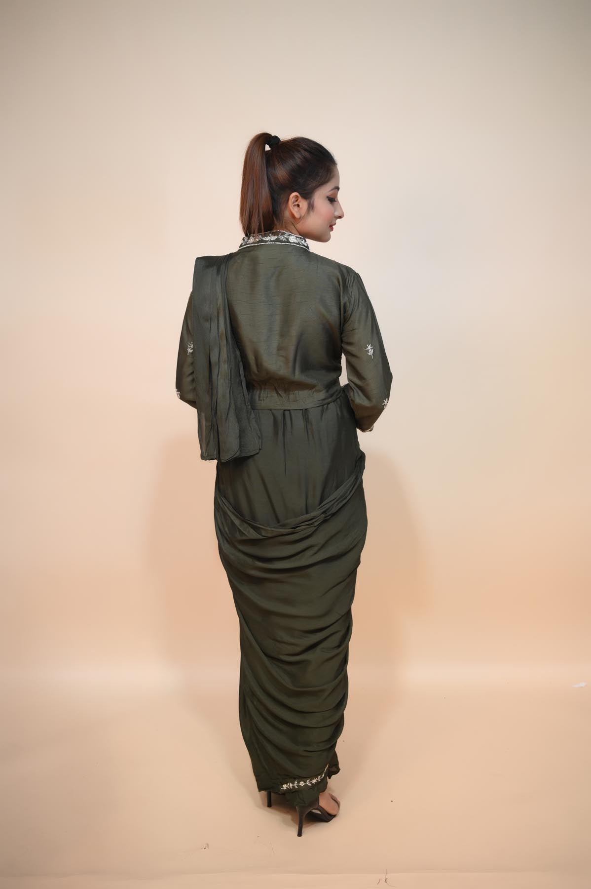 Mesmerizing Mehndi Green Raw Silk Dress: Exquisite Mirror Work, Cut Dana, and Sequin Embellishments"