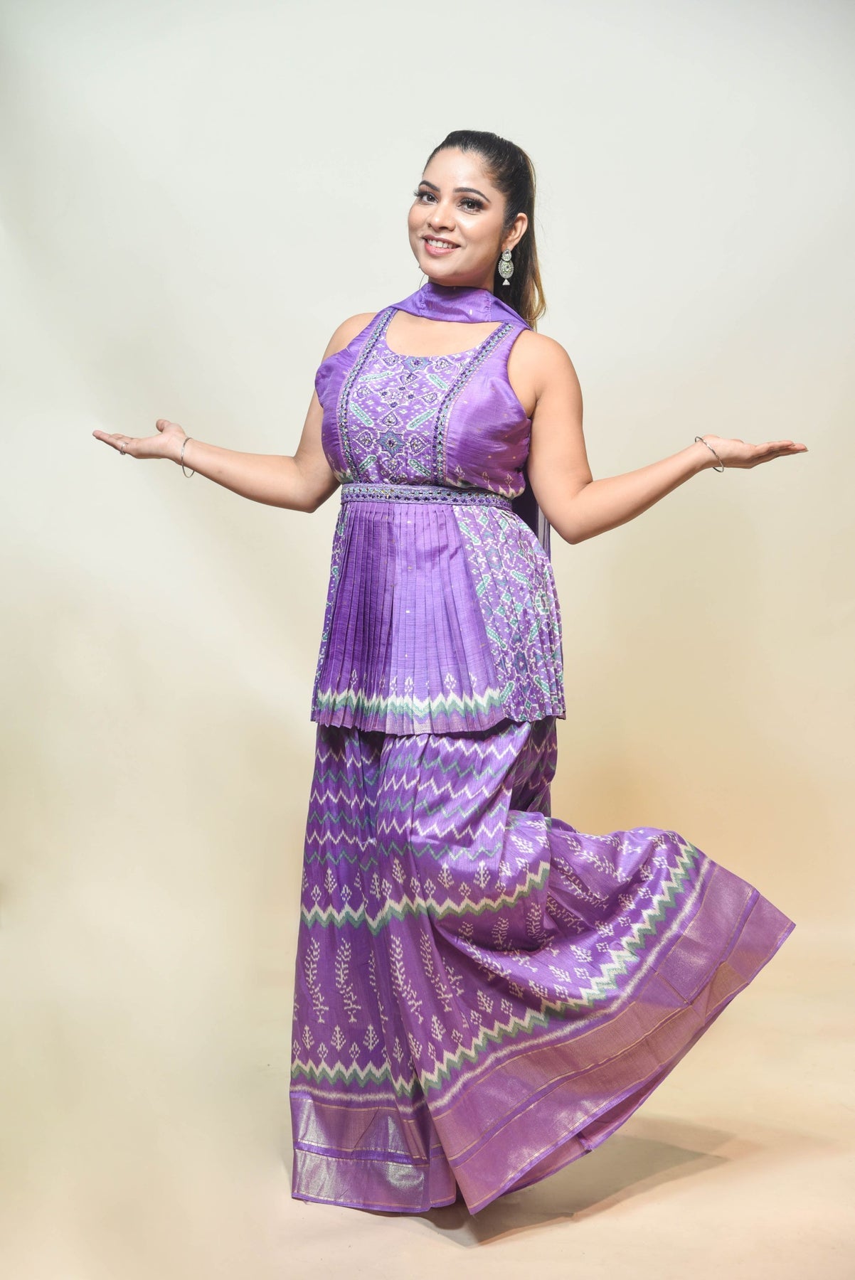 stylish purple color geometrical motif peplum top & sharara set