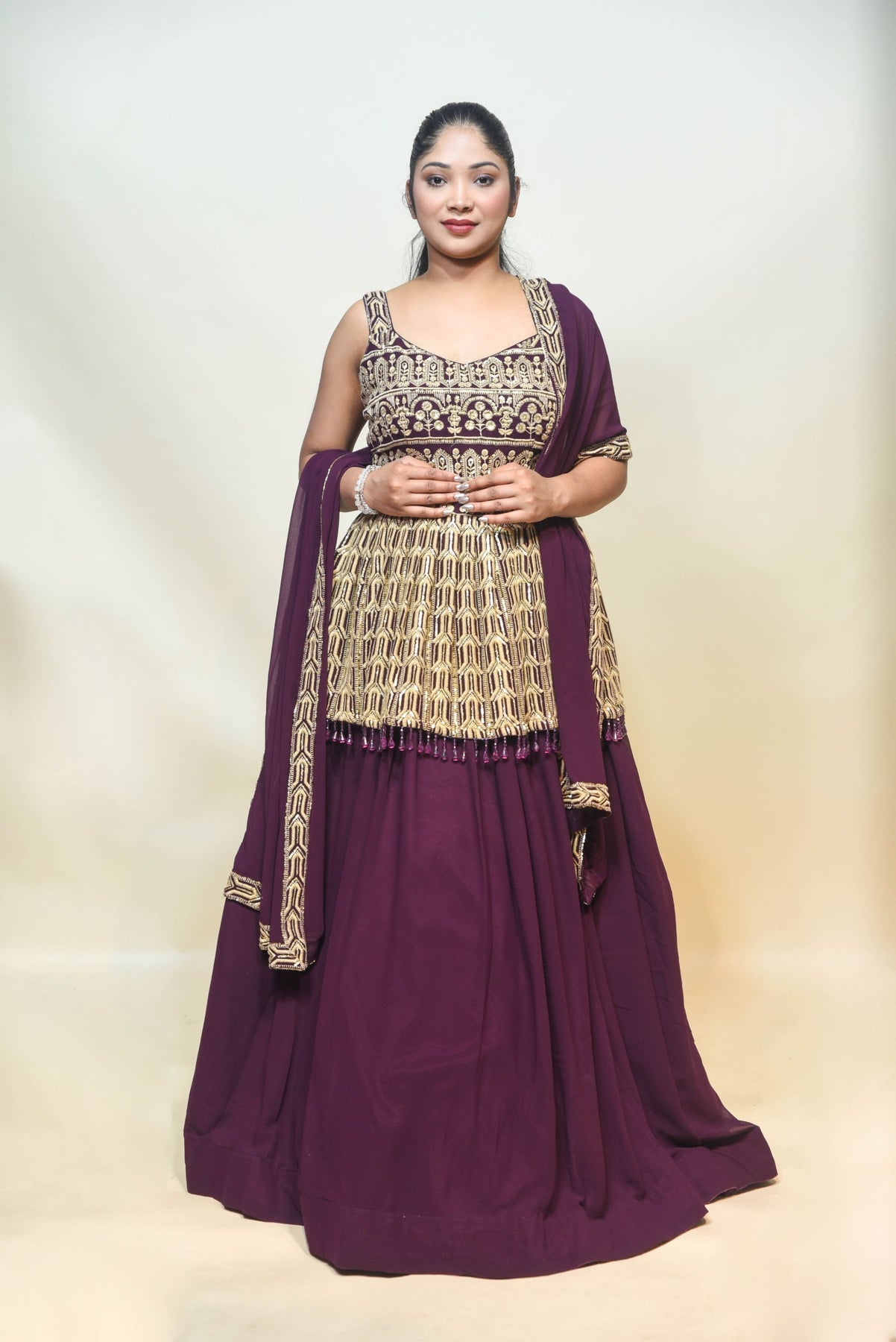classic wine color floral motif peplum top and lehenga set
