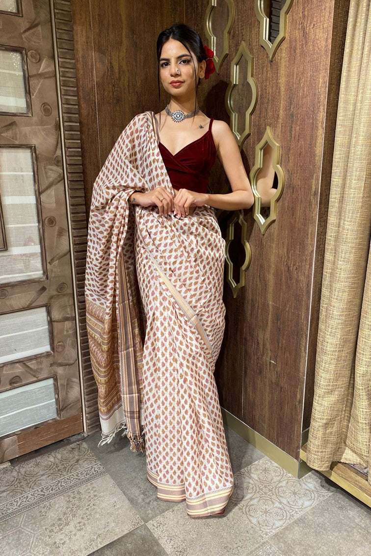 Classic beige floral motif printed cotton saree