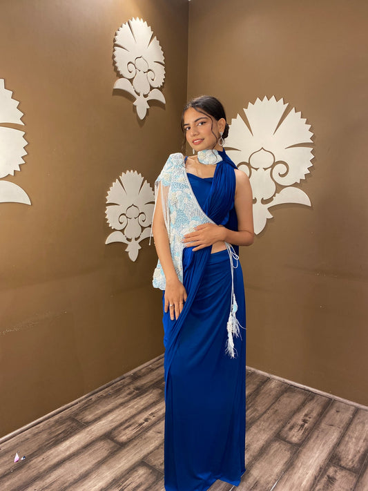 Trendy blue color floral motif embroidered drape saree