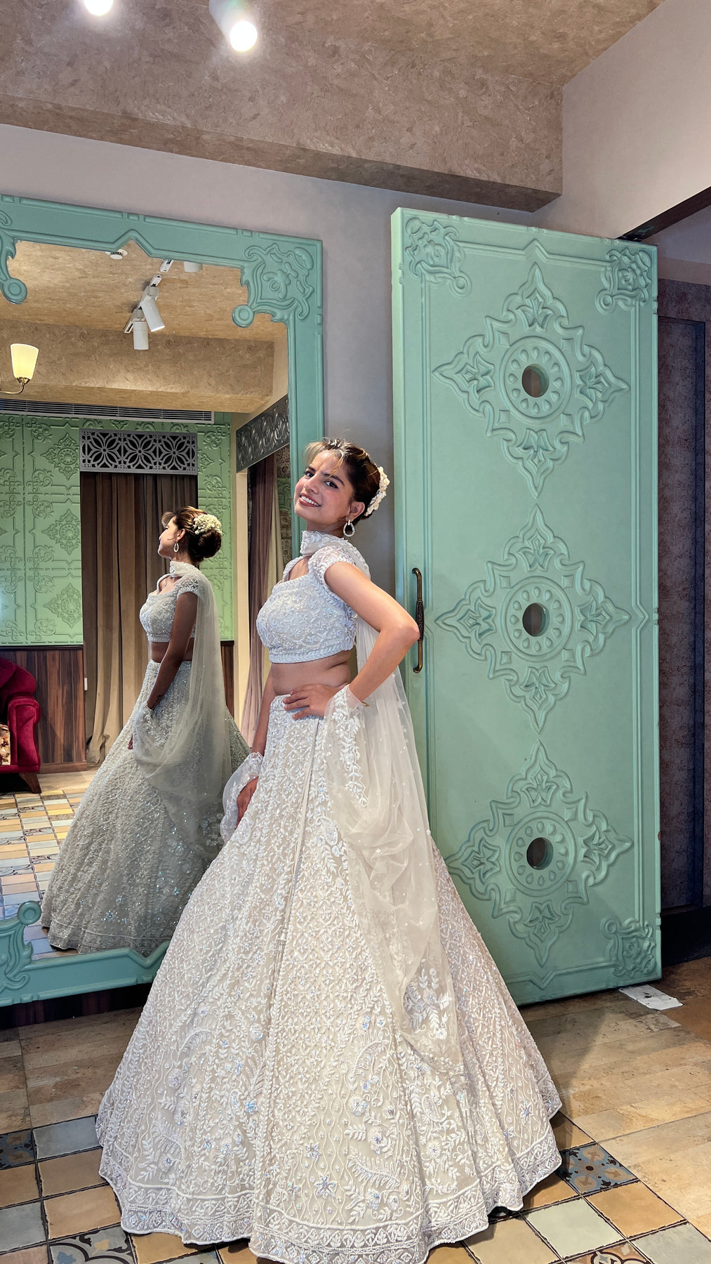 elegant white color floral motif embroidered lehenga