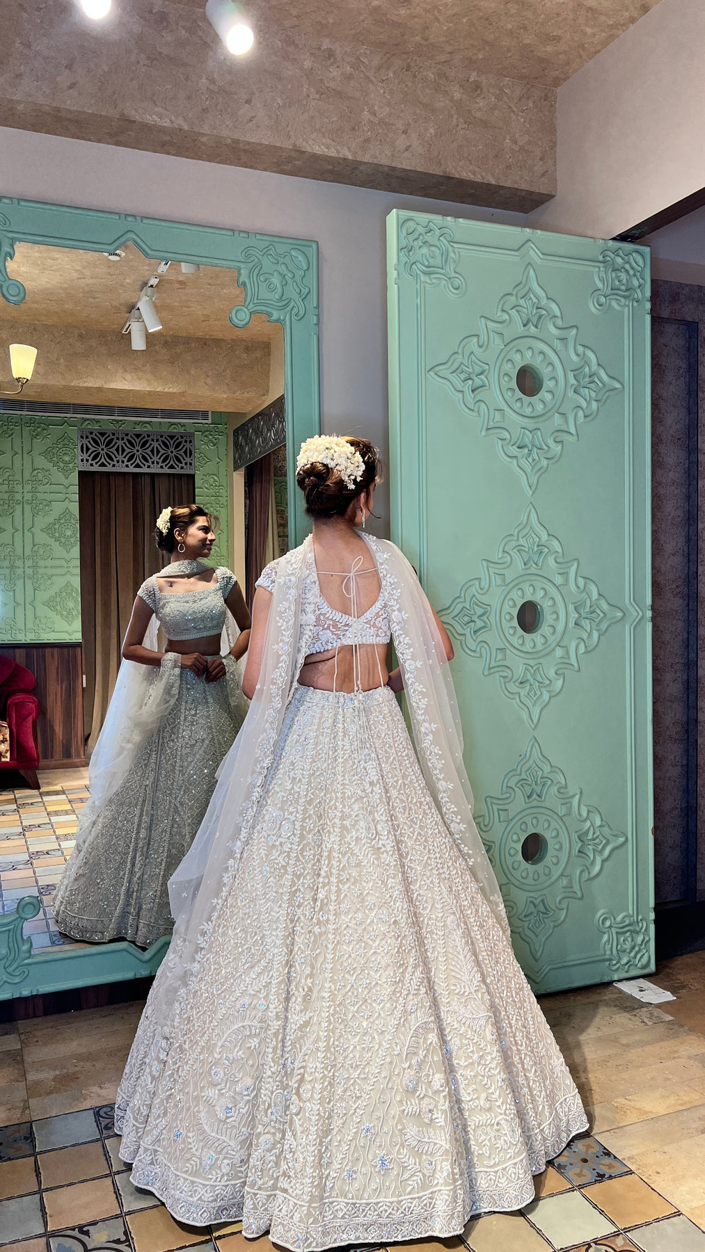 elegant white color floral motif embroidered lehenga