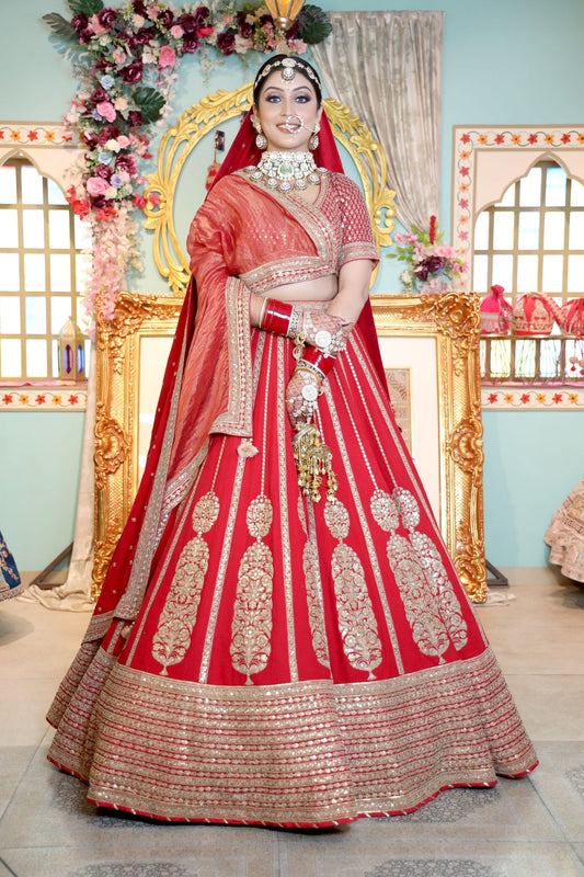 beautiful red color bridal embroidered lehenga with heavy blouse and matching dupatta