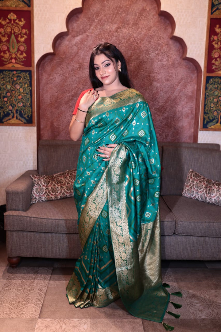 Exquisite Til Blue Handloom Silk Saree with Golden Detailing