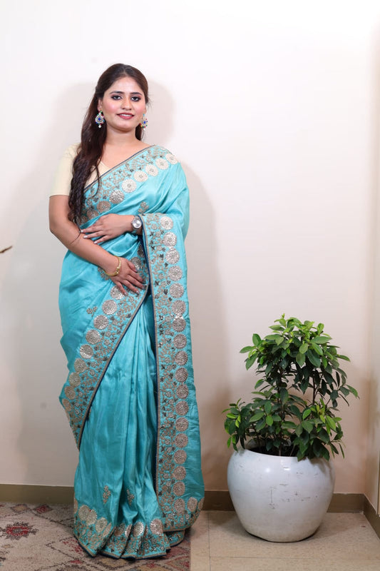 Graceful Sky Blue Handloom Saree with Exquisite Embroidery