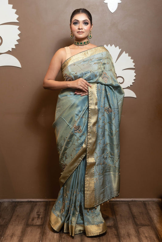 trendy green color geometrical motif saree