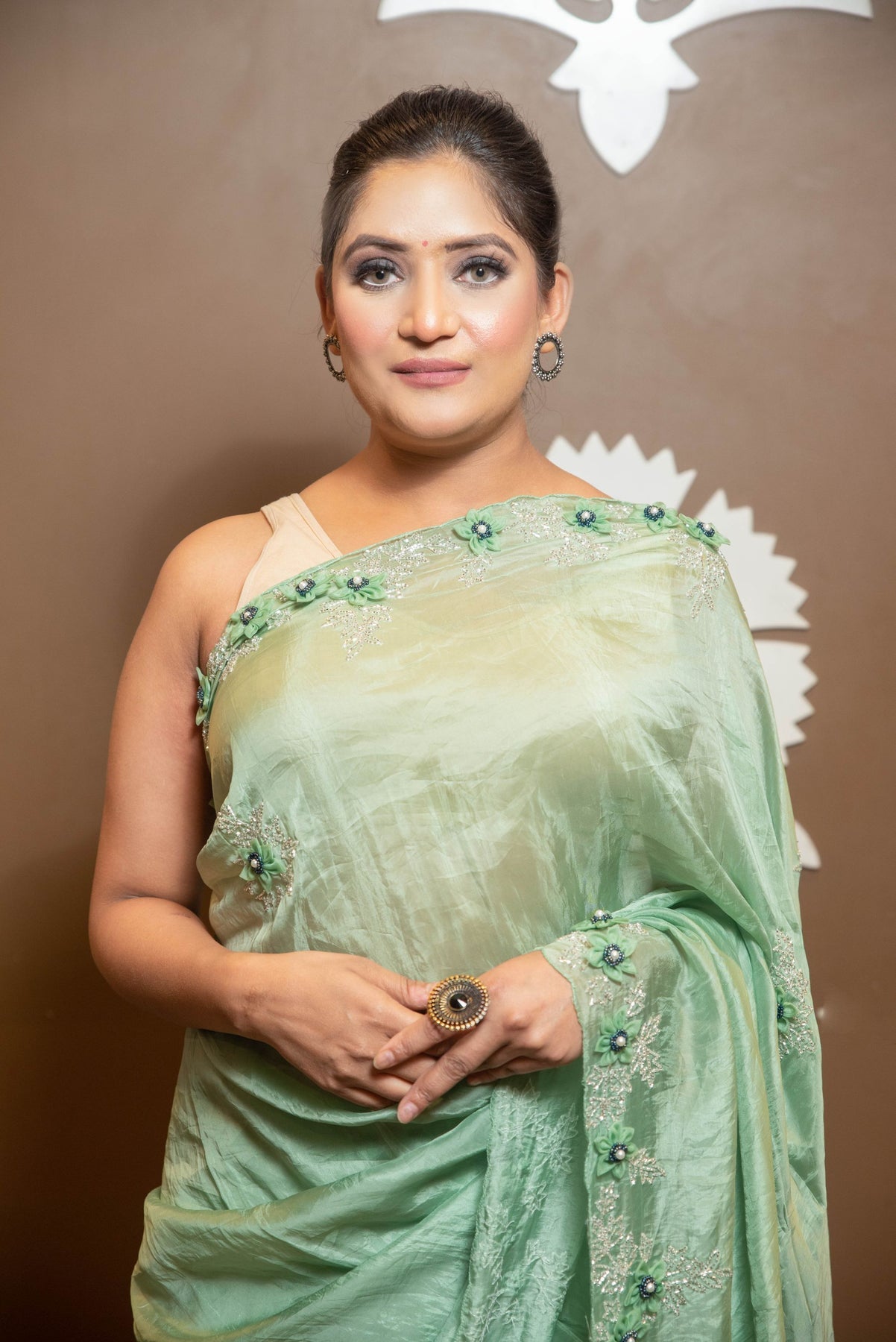 stylish light green color floral motif embroidered saree