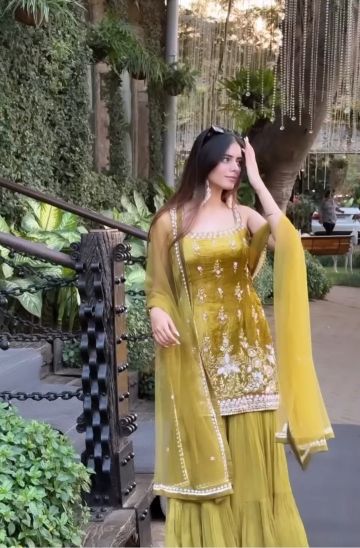 elegant green color floral motif embroidered sharara set
