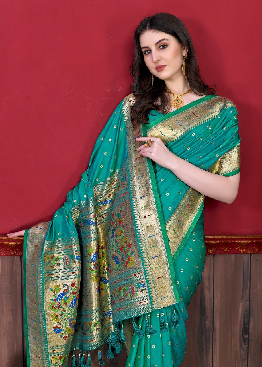 Eye-catching Rama Paithani Silk Saree With Ethnic Blouse Piece