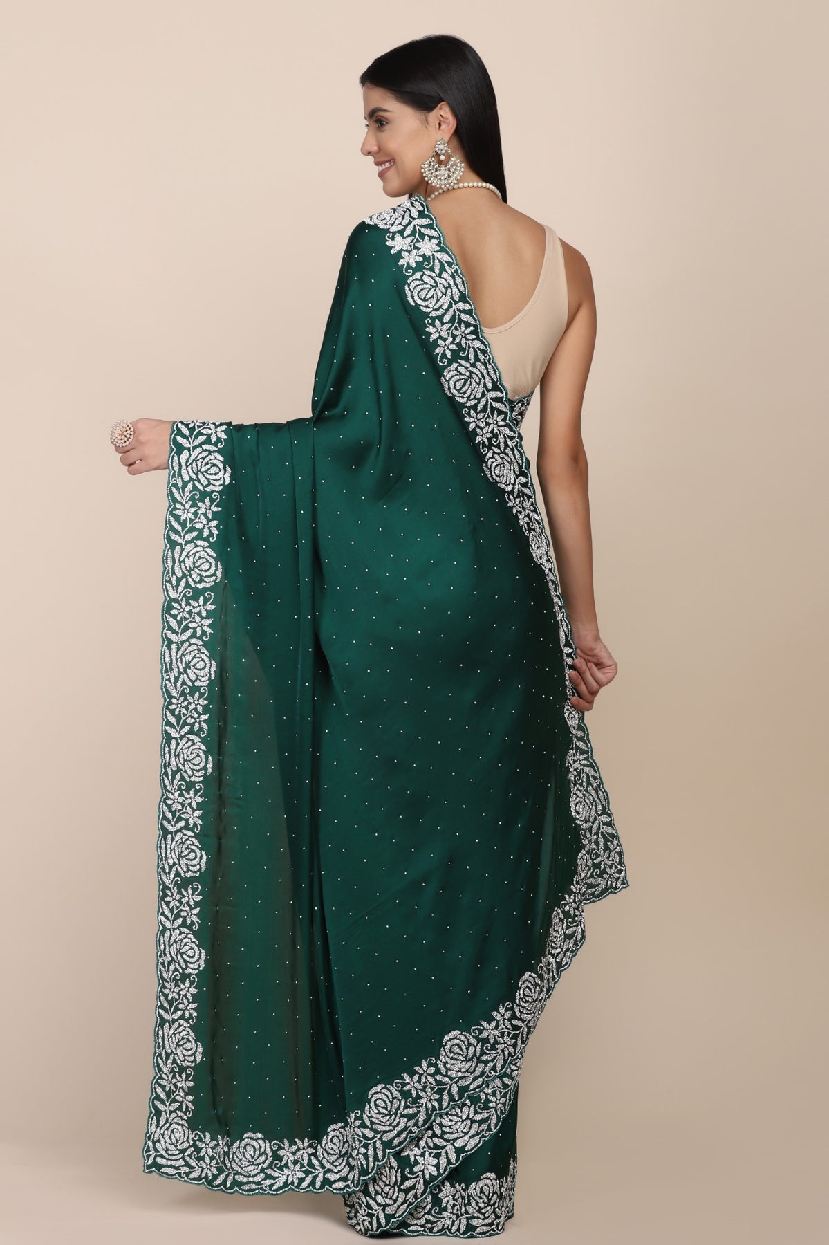 Elegant dark green color floral motif embroidered saree