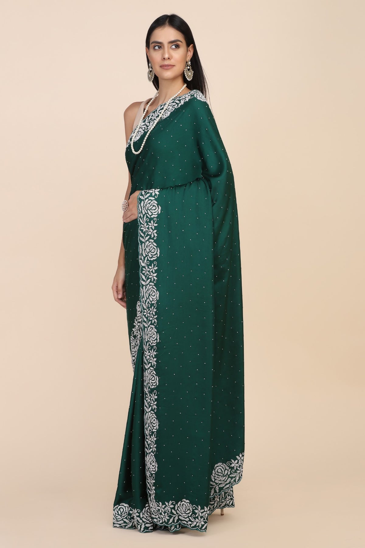 Elegant dark green color floral motif embroidered saree