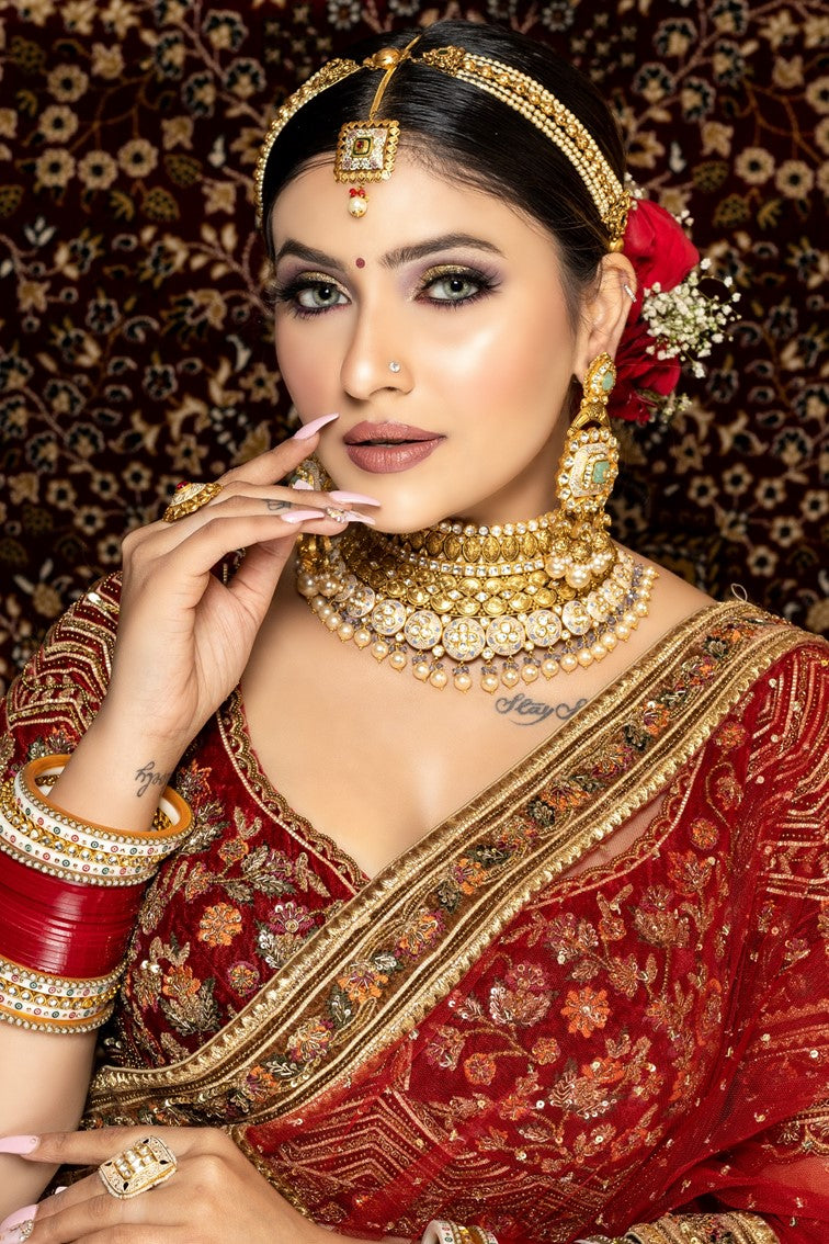 Beautiful Red & Golden Colored Hand Embroidered Bridal Lehenga