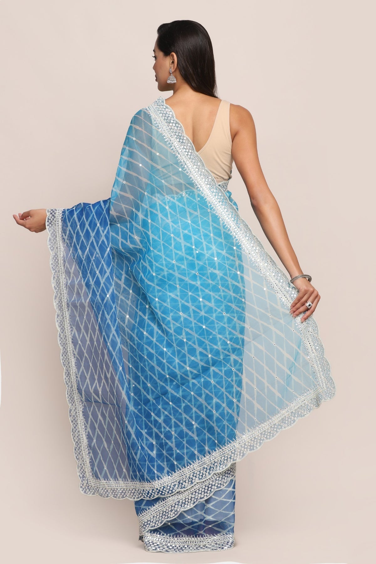Elegant blue color tie and dyed embroidered saree