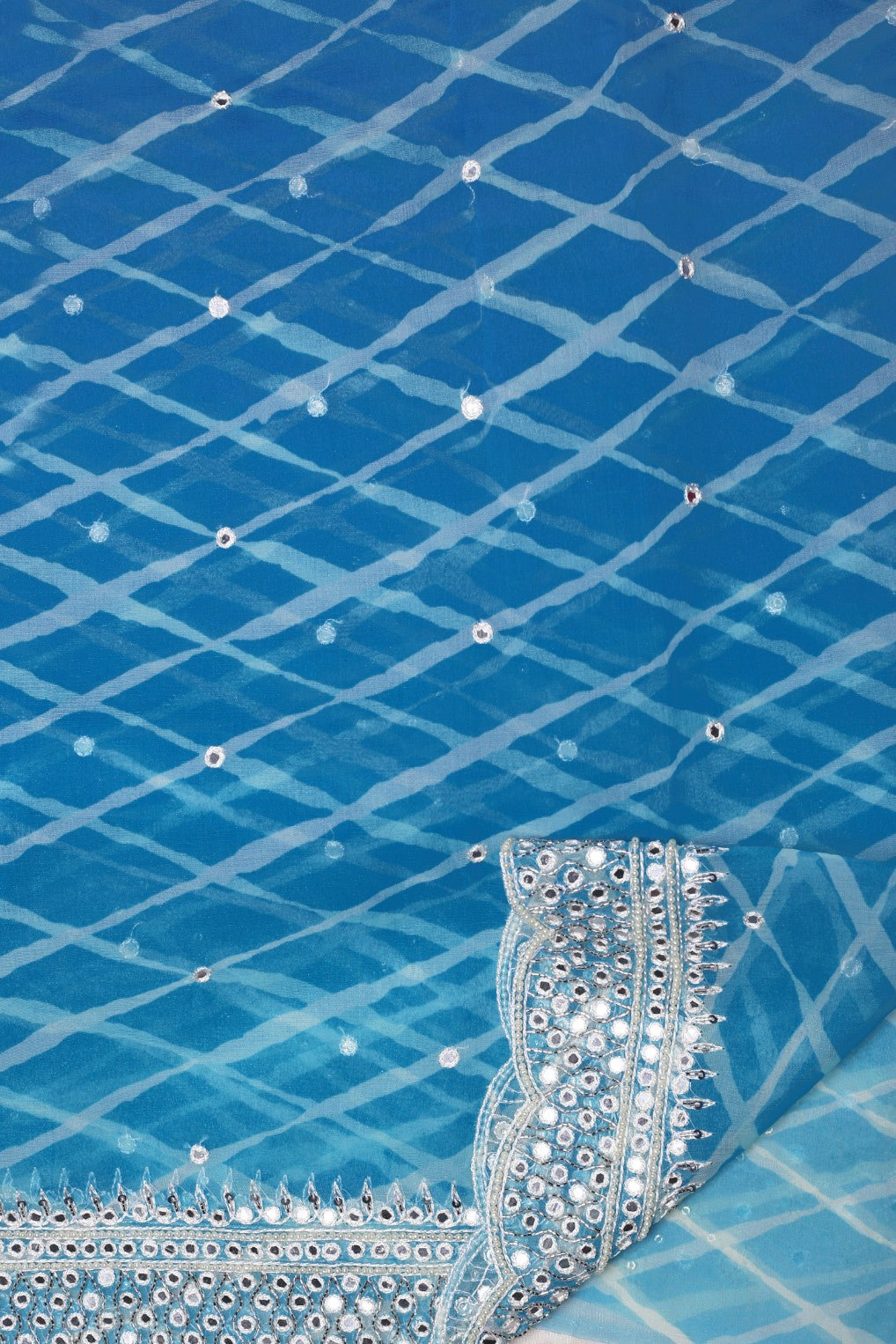 Elegant blue color tie and dyed embroidered saree