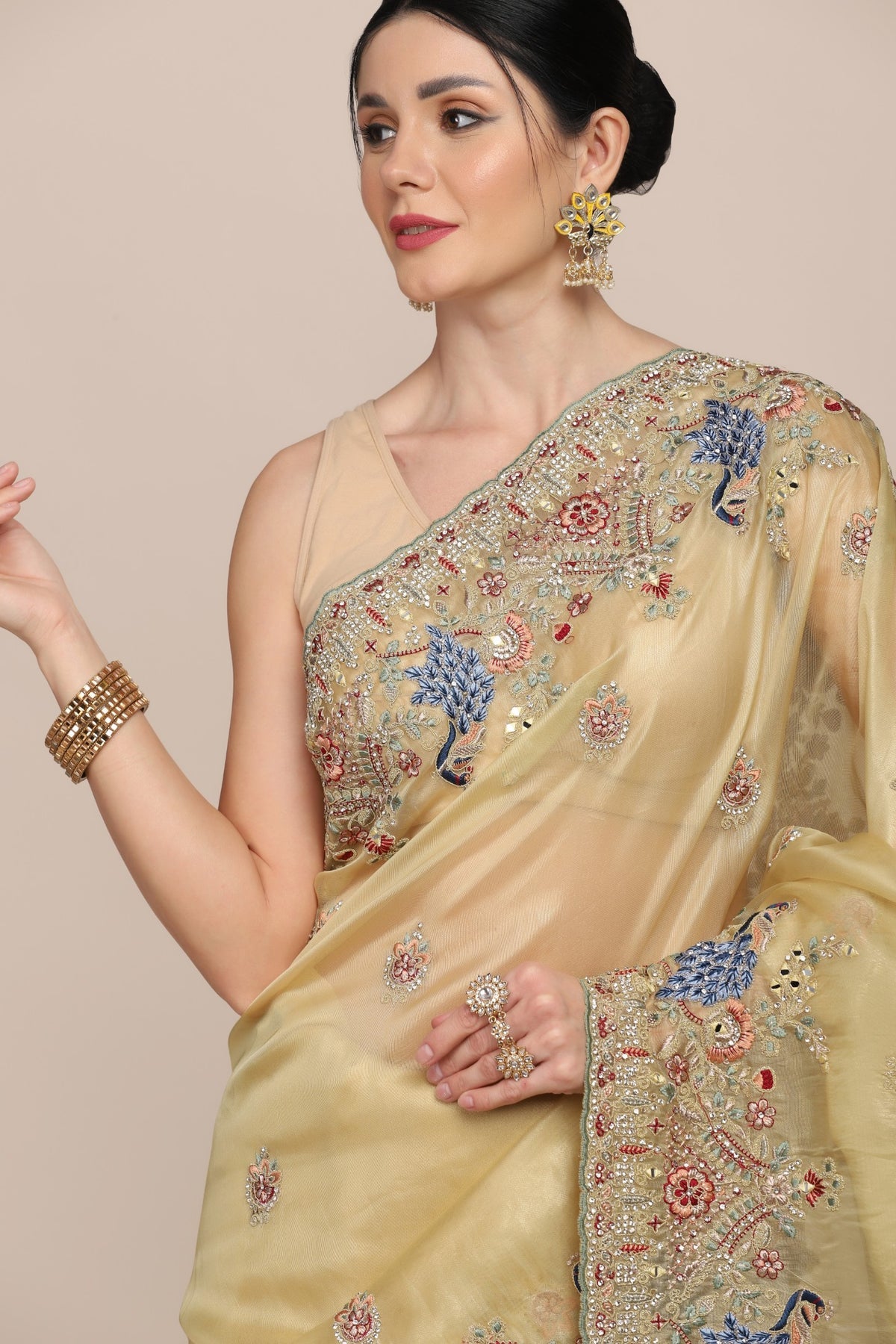 Elegant yellow color peacock motif embroidered saree