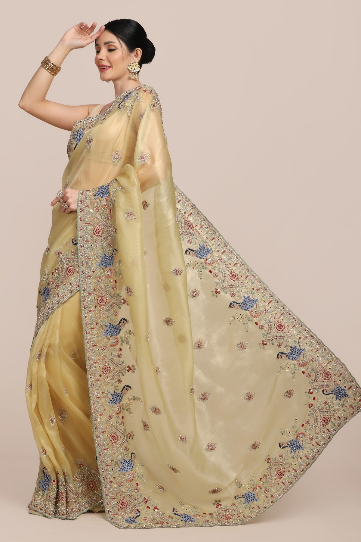 Elegant yellow color peacock motif embroidered saree
