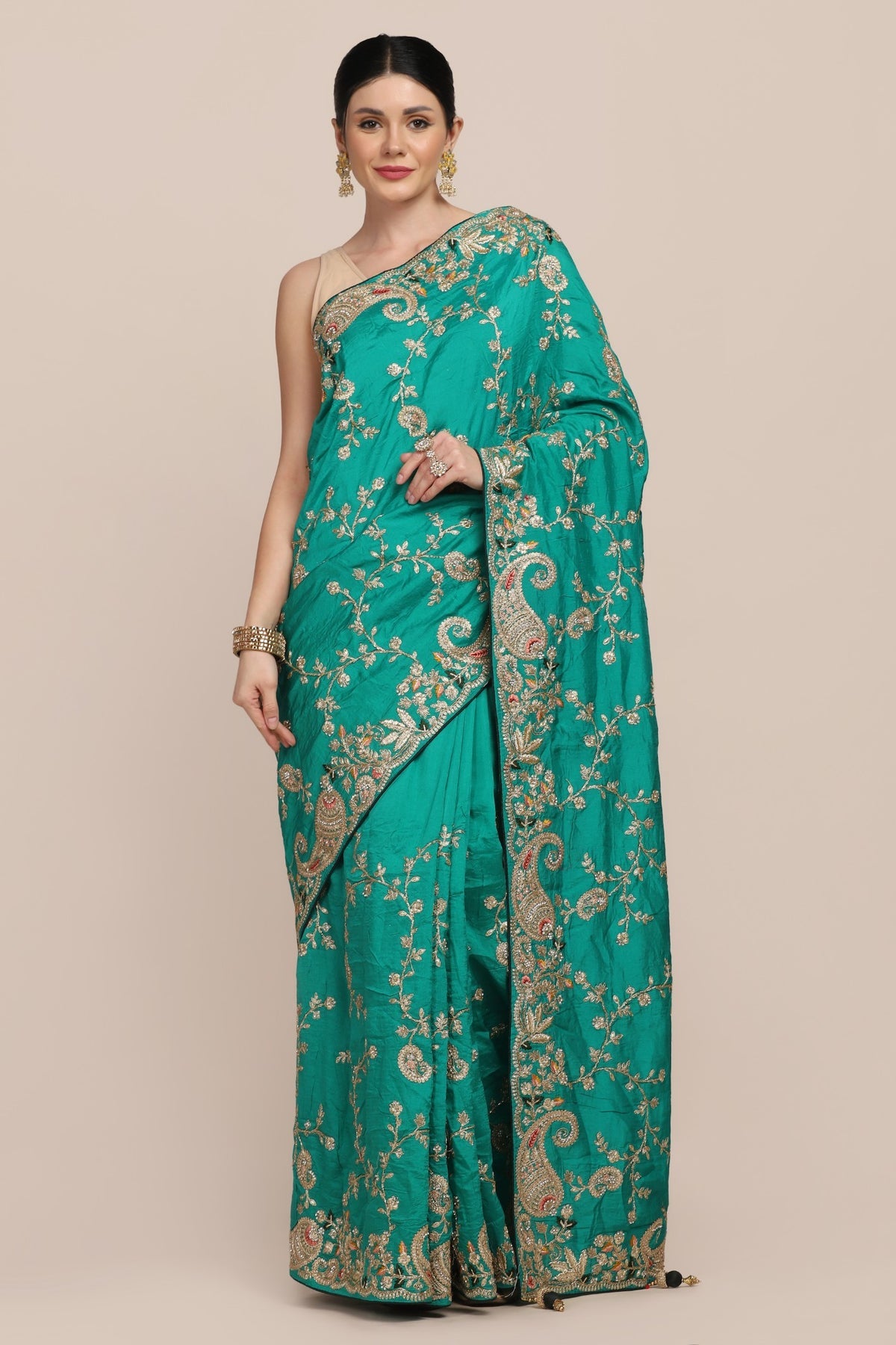 Beautiful peacock green color paisley motif embroidered saree